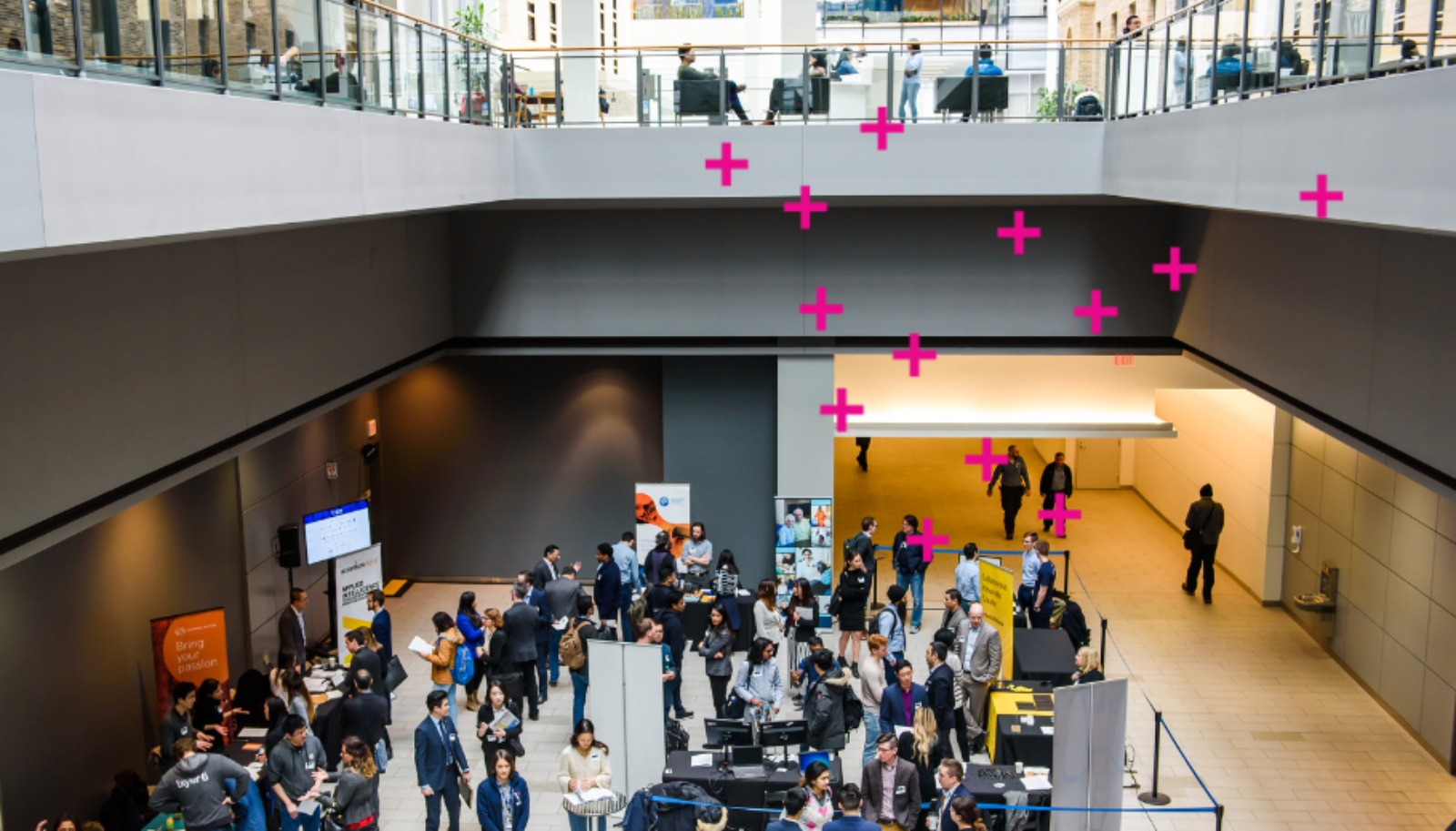 people networking in atrium office setting